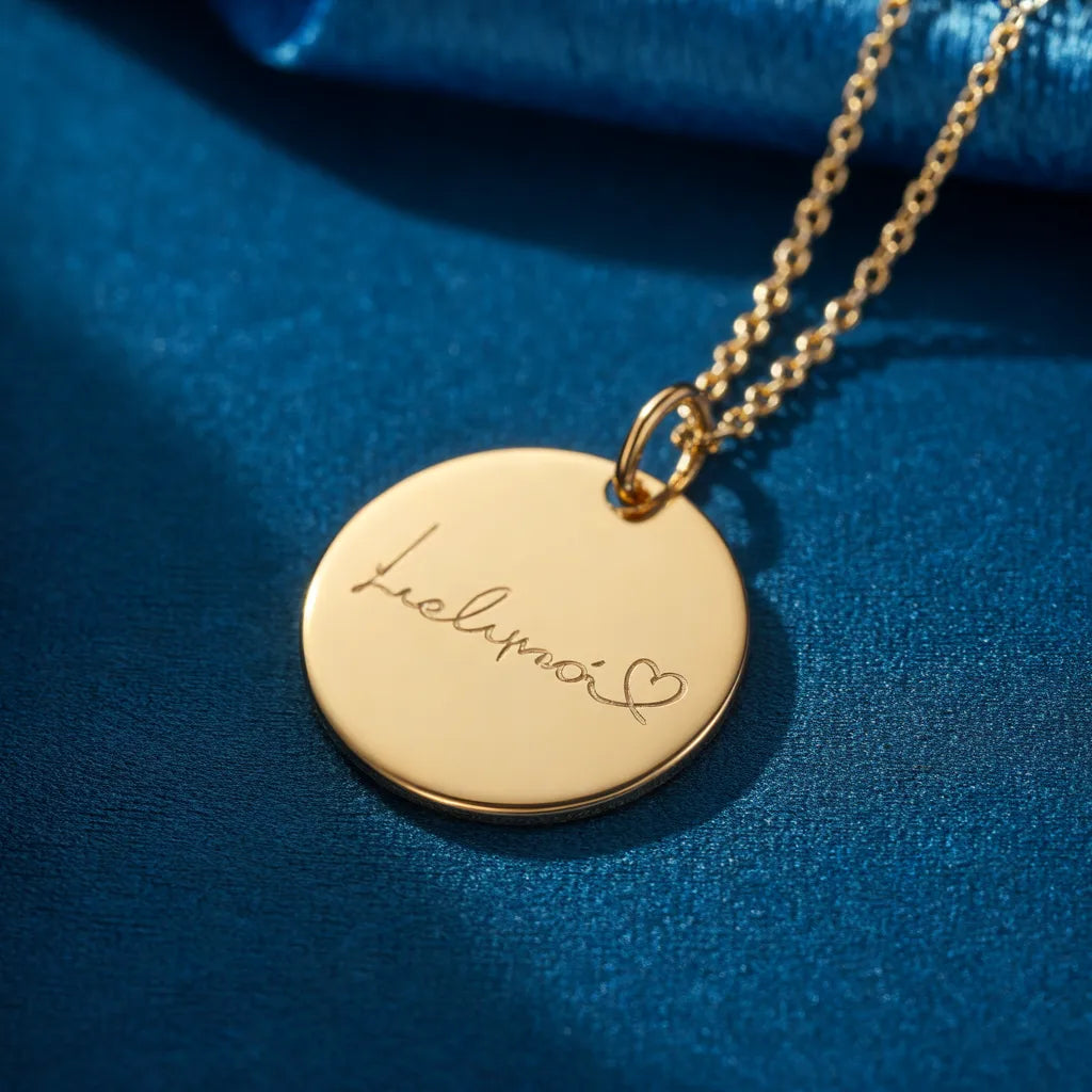 Gold disc pendant engraved with handwriting, design preview