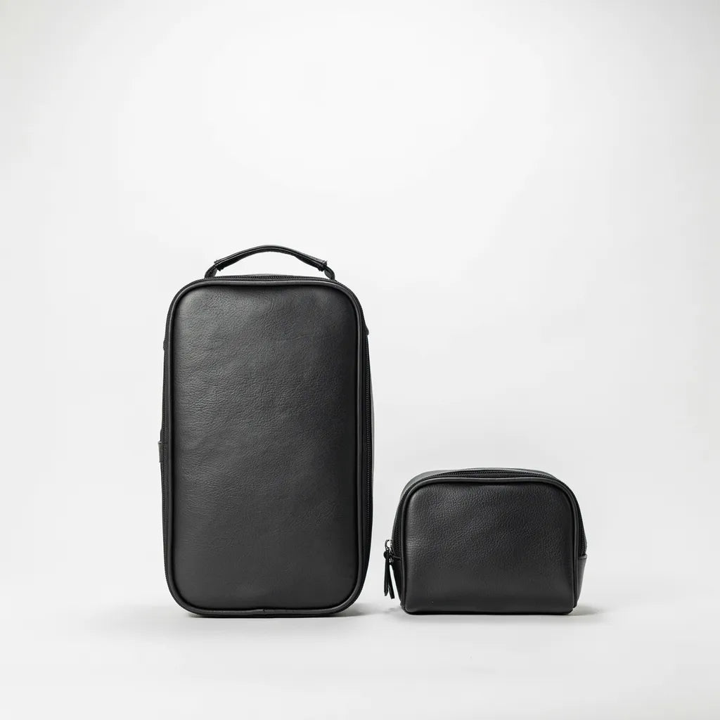 Wireless charging laptop bag in black with accessory pouch — white background